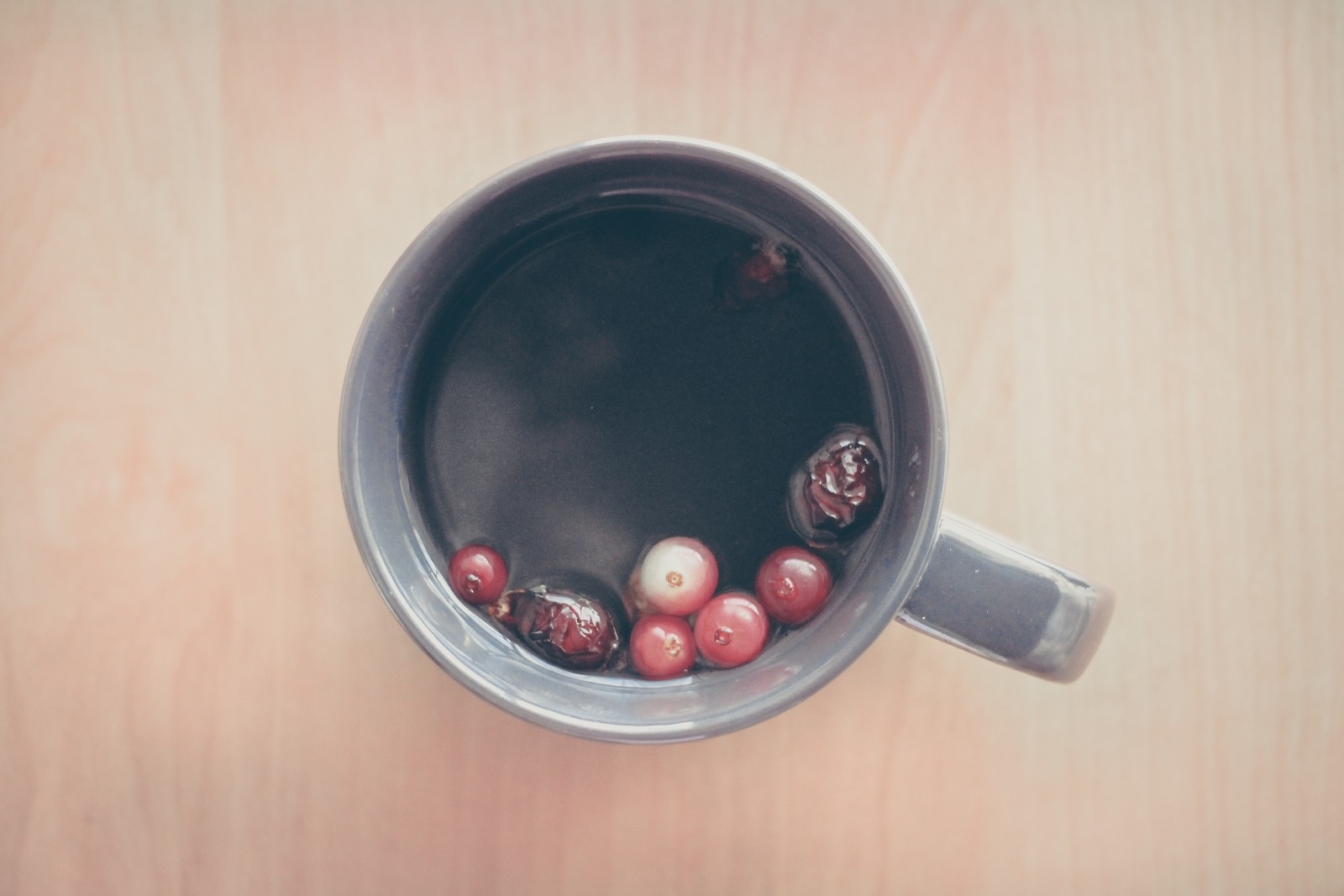 An image of a tea cup with tea inside